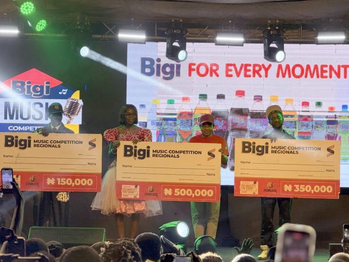 From left: BIGI Music Competition second runner-up, Ibrahim Yakubu Binkalim (Ibrahim Binkaly); winner, Olaniyi Oluwakemi Abisola (Abisola); and first runner-up, Moses Yakubu Ibrahim (Bhig Moe), display their cash prizes after the competition at the Soundcity OnTour activation at Ahmadu Bello University, Zaria